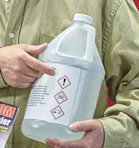 chemical container with visible chemical pictograms