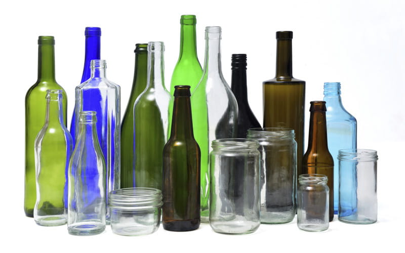 Clear and colored (green, blue, brown) food glass jars and bottles