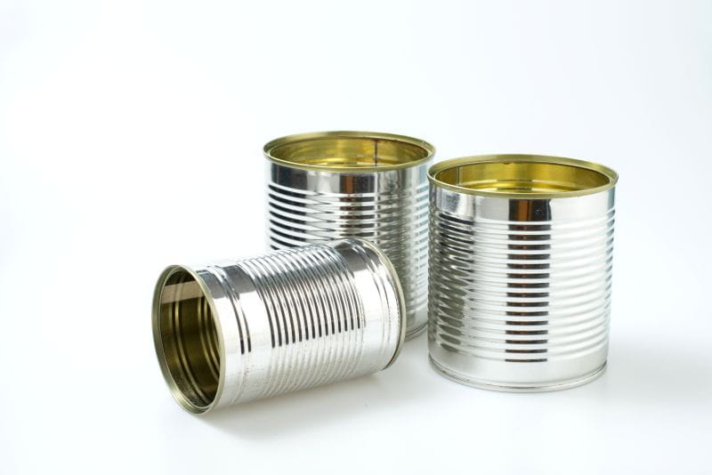 Three empty, label-less cans