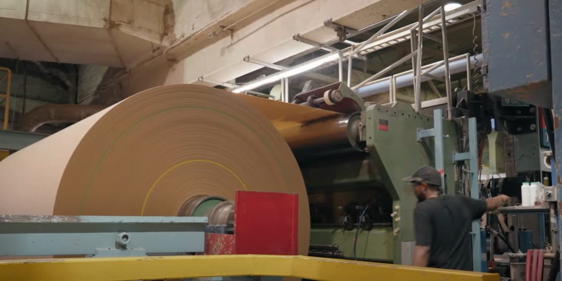 Paper roll being manufactured at UP Paper. Screenshot from Recycling Raccoons video.