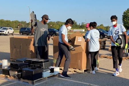 Volunteers at the electronic waste recycling collection event in Meridian Township in 2021. 