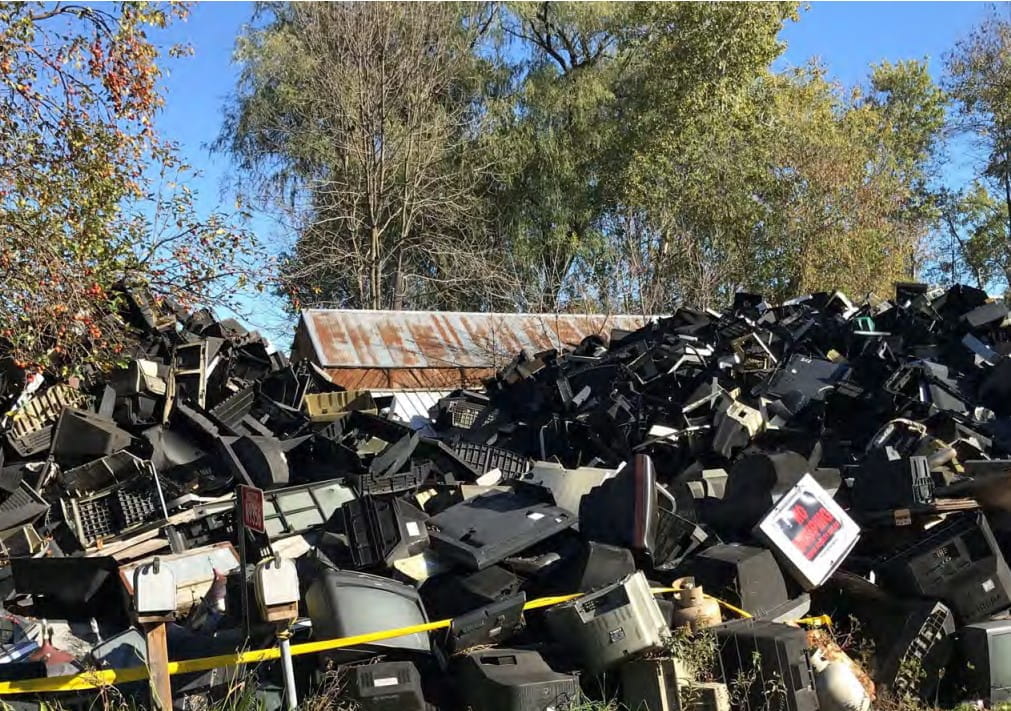 Pile of TVs before a fire
