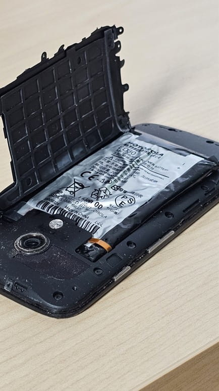 Damaged battery in a smartphone. 