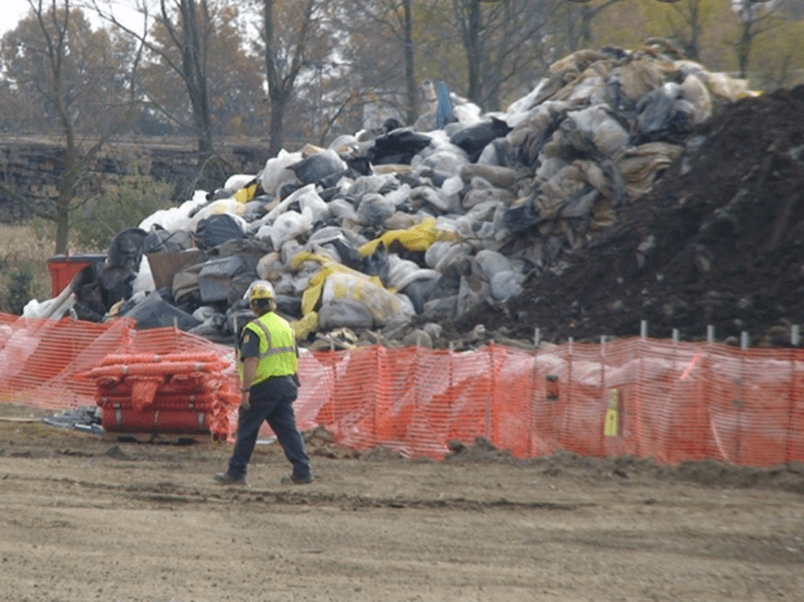 Construction worker walking at an emergency transfer site