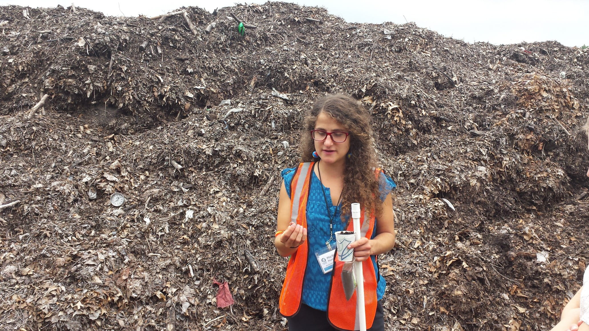 Staff in front of commercial compost