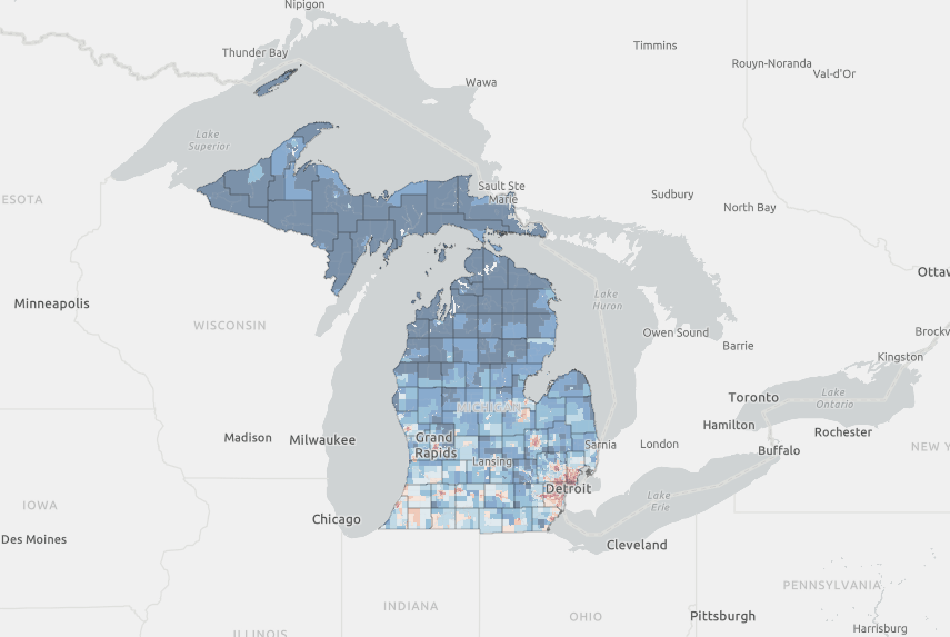 A screenshot of the MiEJScreen app, showing the majority of the state colored dark blue indicating lower scores and southeast Michigan and several other metro areas colored red indicating higher scores