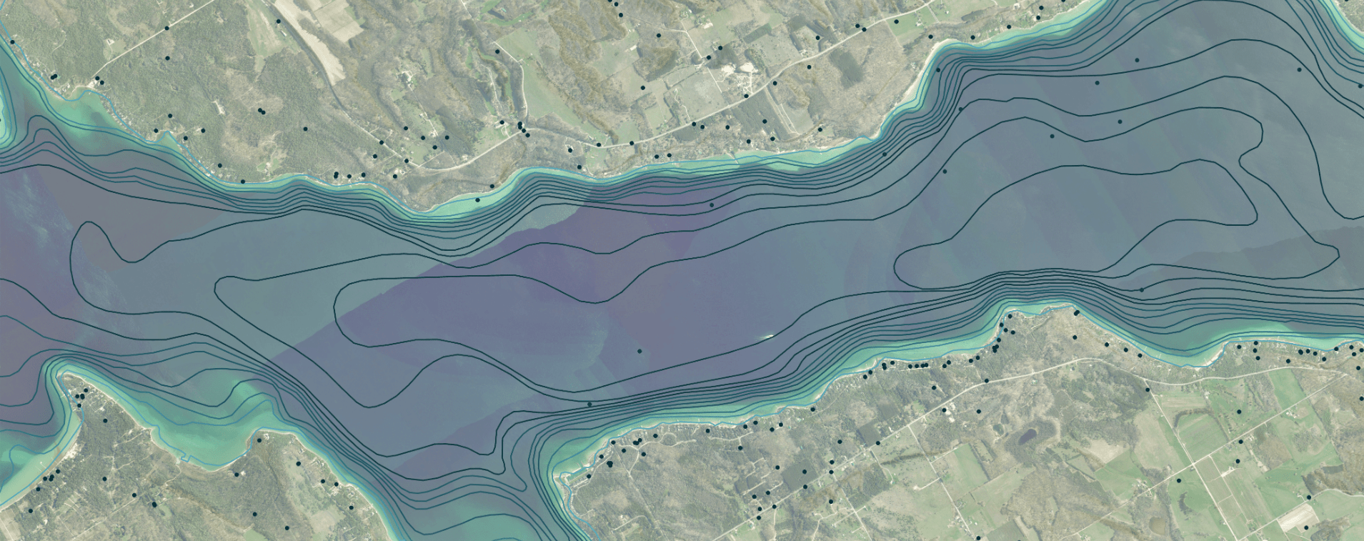 An aerial view of a river with faint bathymetric lines and scattered points on land