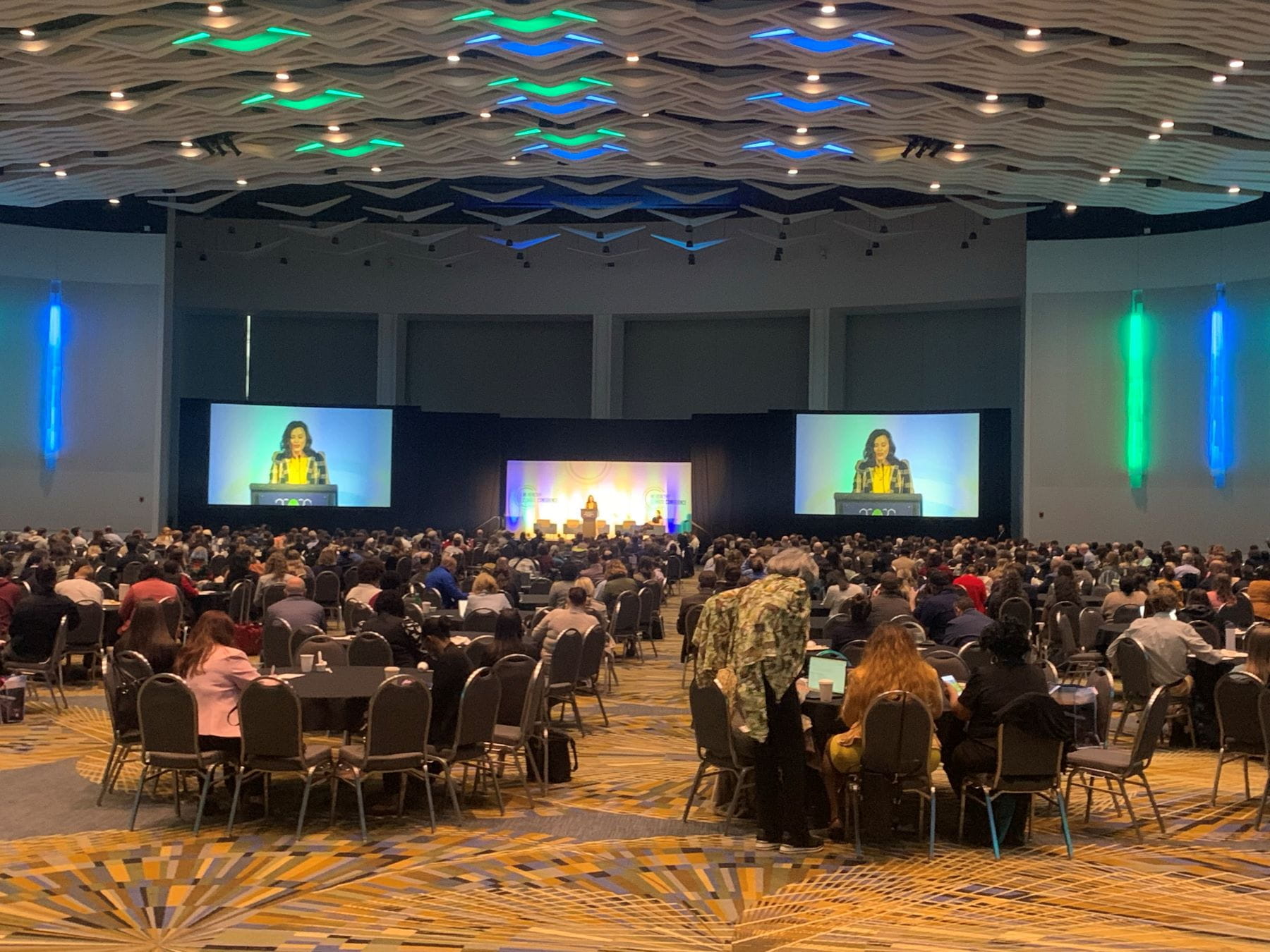 Room filled with attendees at the MI Healthy Climate conference in 2025 listening to Gov. Whitmer.