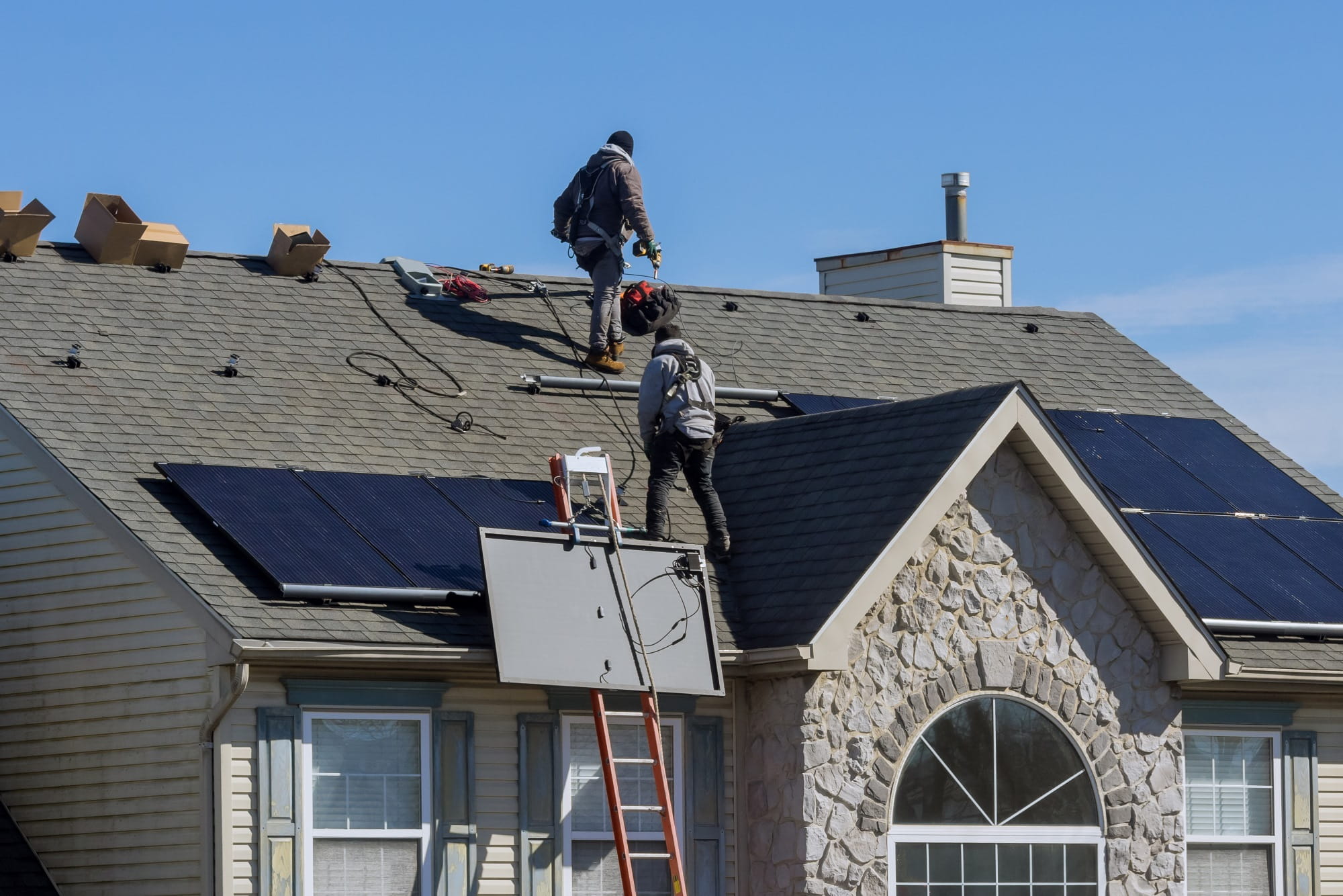 Picture of a house and installation of solar panels