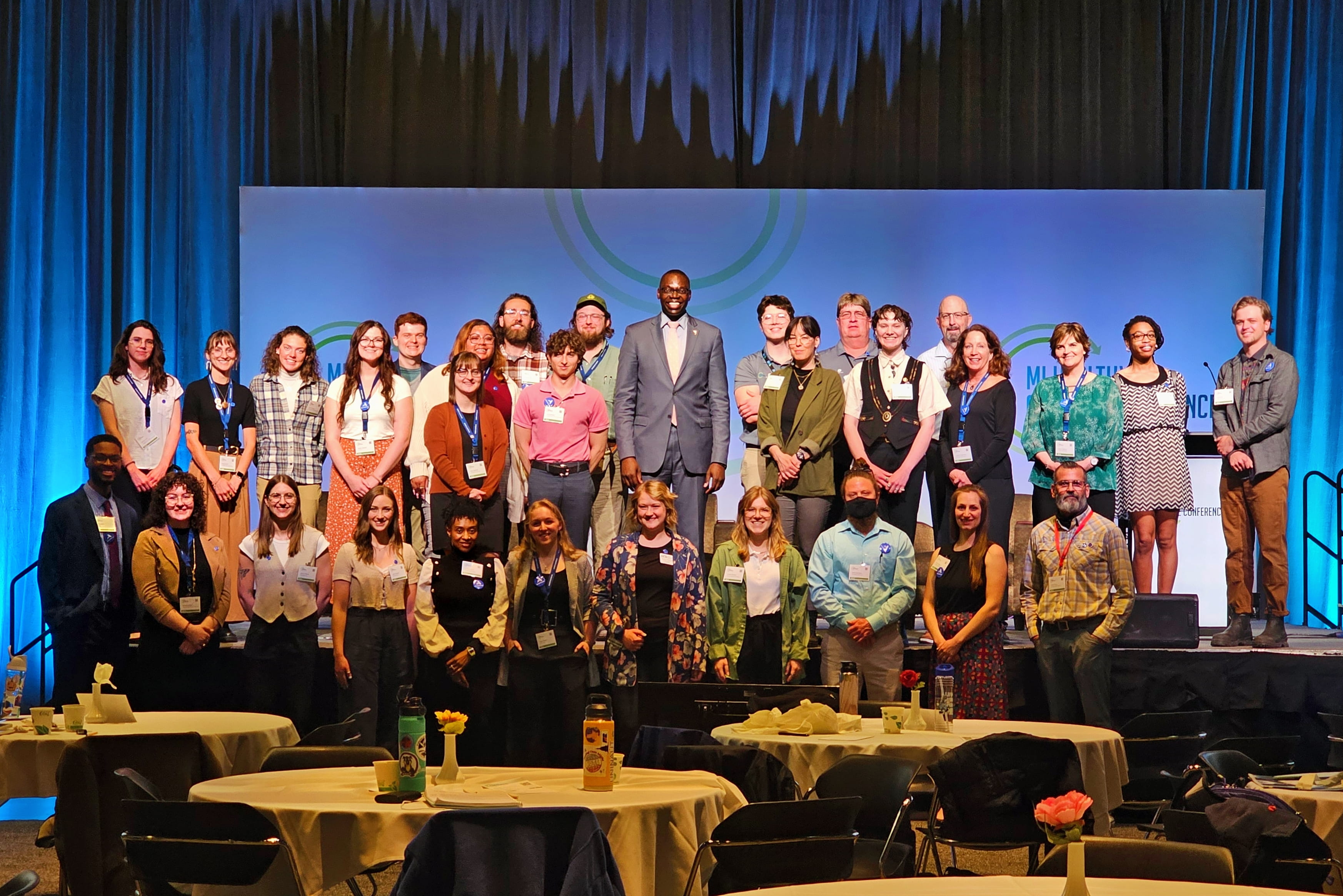 MI Healthy Climate Corps members gather for a group photo with Lieutenant Governor Garlin Gilchrist II, who addressed the MI Healthy Climate Conference on Thursday, May 16.