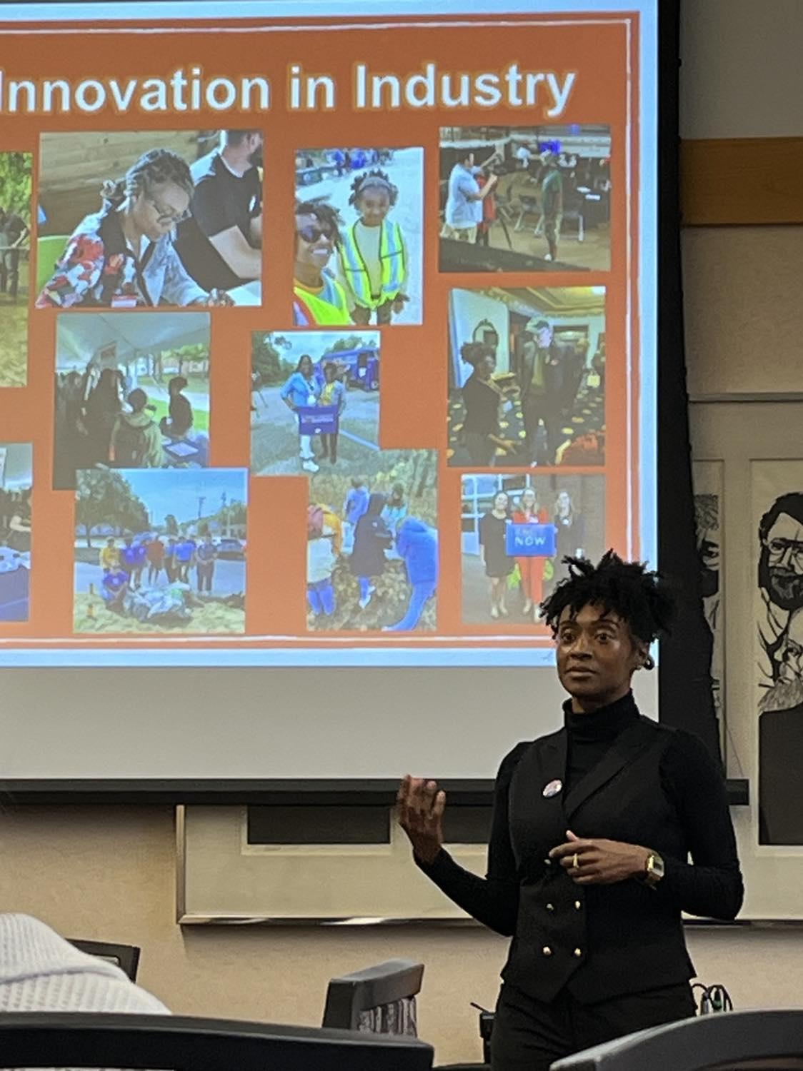 MI Healthy Climate Fellows member Jessica Austin gives a presentation about her term of service in the fellows’ first cohort. Austin served with the West Michigan Environmental Action Council. 