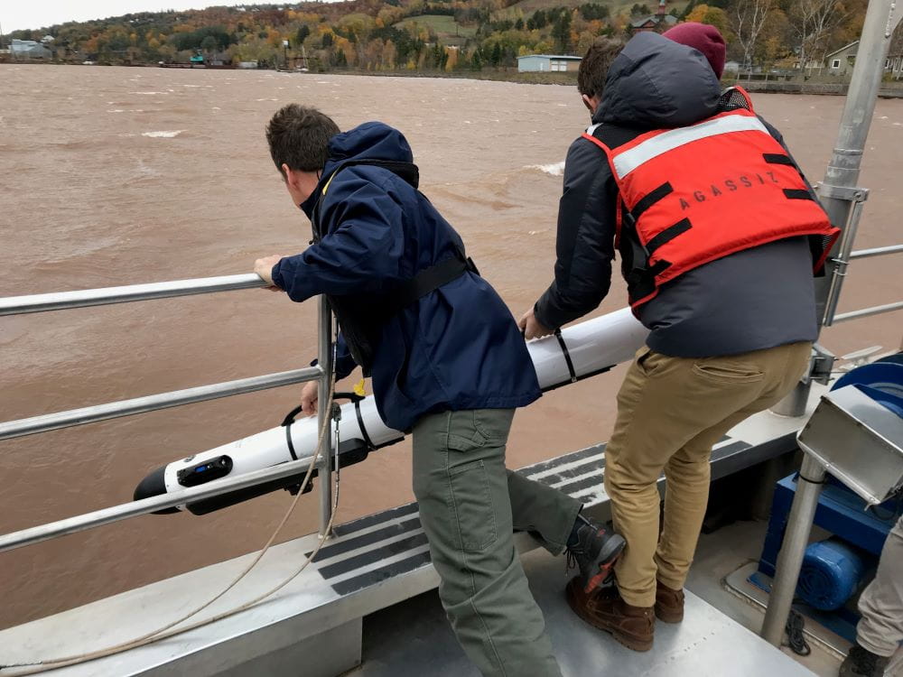 Researchers deploy Michigan Tech’s Autonomous Underwater Vehicle (AUV) IVER 3 in the Keweenaw Waterway to take a closer look at an unmarked shipwreck