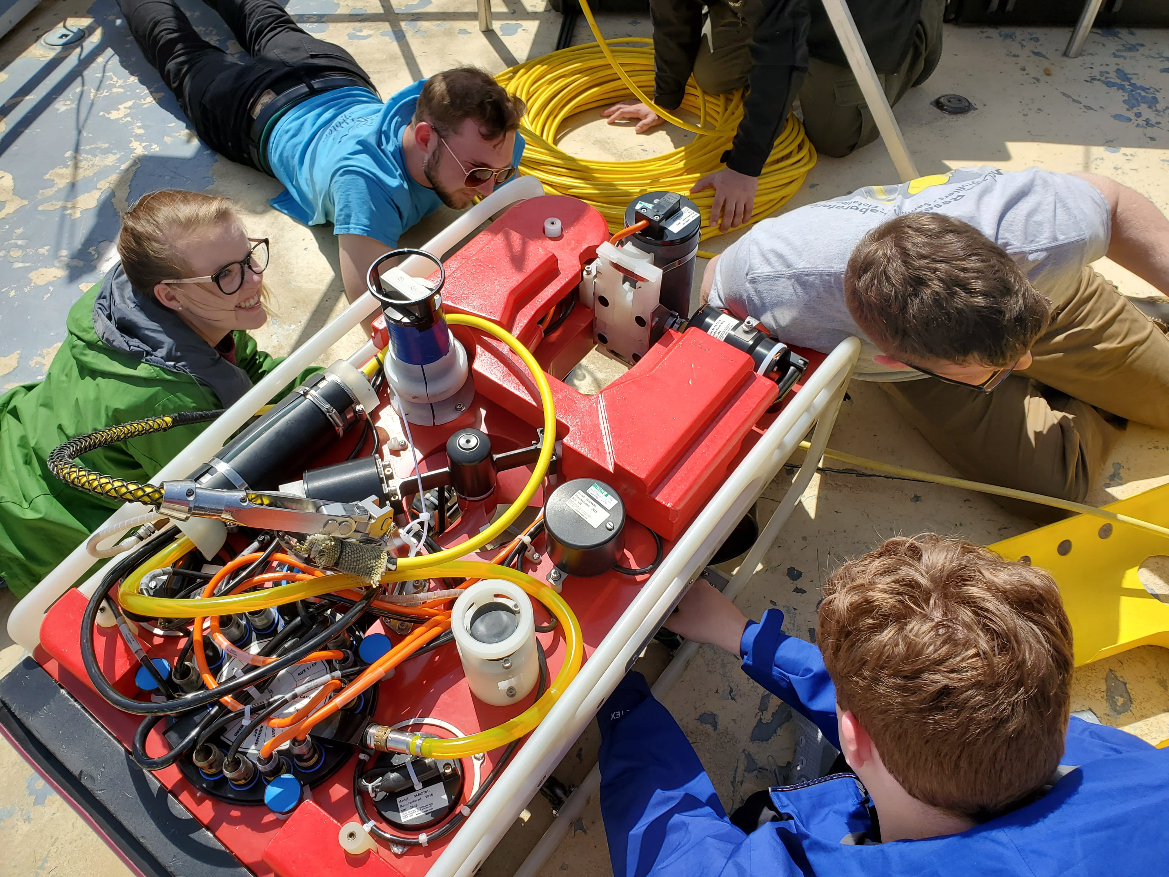 Students from universities across the country prepare for a remote-operated vehicle (ROV) dive while attending marine technology bootcamp training activity at Northwestern Michigan College (NMC). Photo courtesy of Great Lakes Water Studies Institute, NMC.