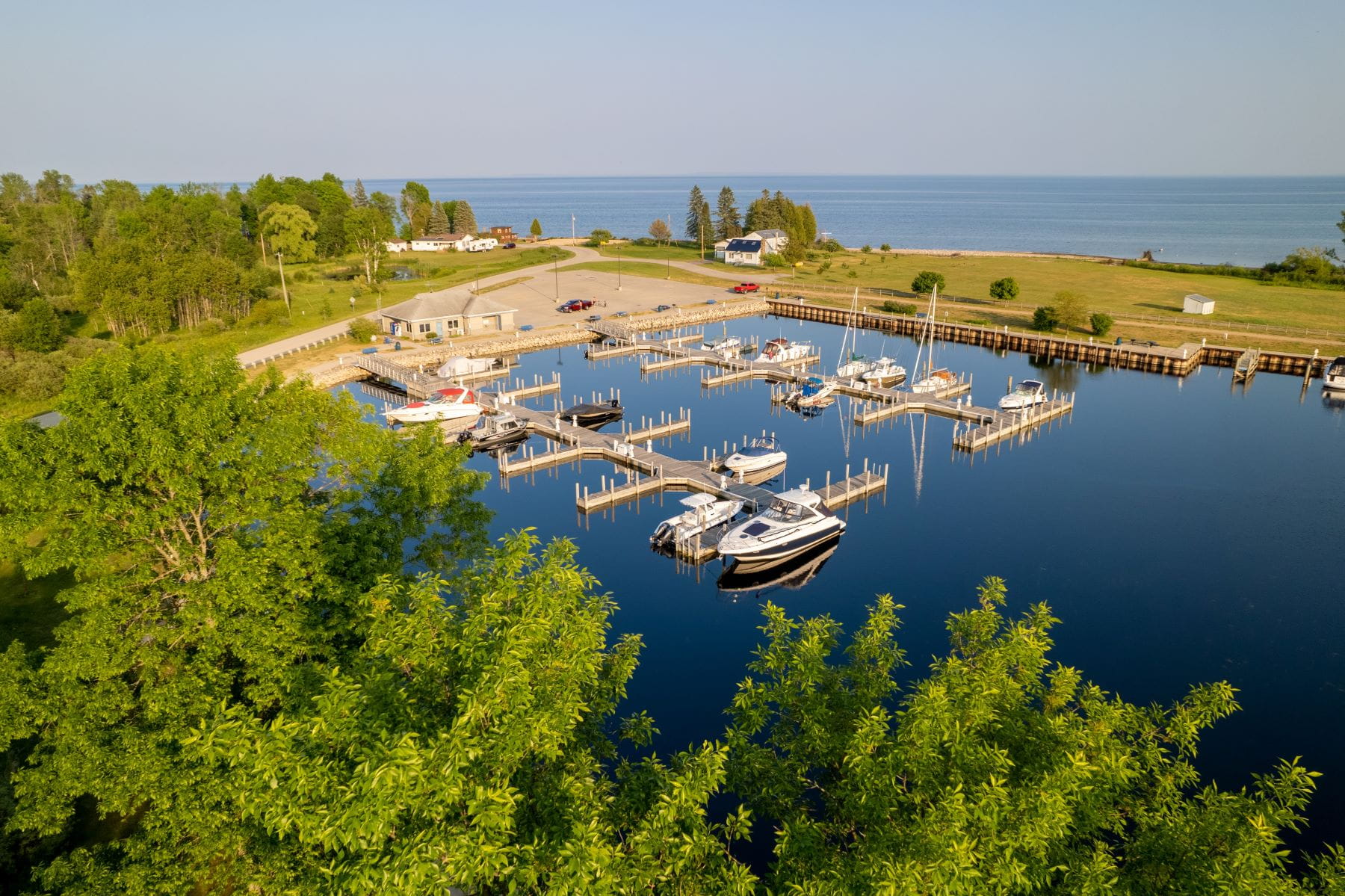 Aerial view of the docks and recreational watercrafts at the marina at J.W. Wells State Park in Cedar River, MI