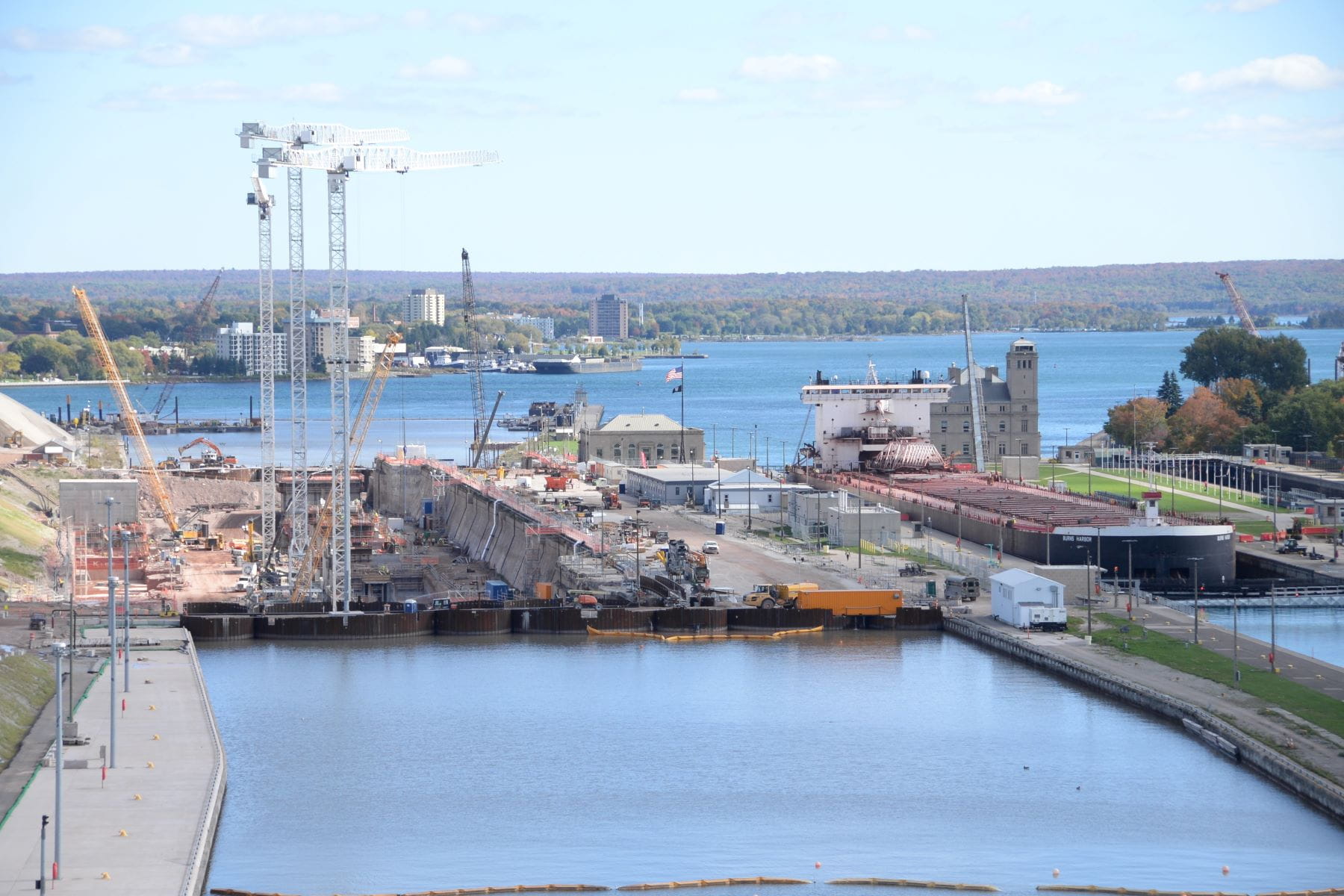 Construction of the new Soo lock with a ship in the current operating lock, taken in October 2025.
