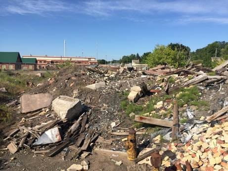 The above photo depicts debris piles on the Mineral Building property.