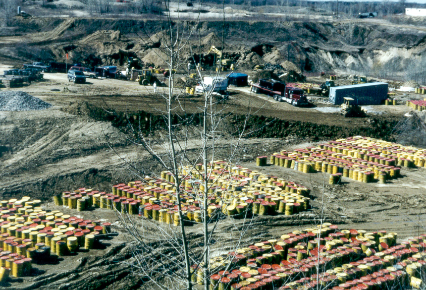Aerial view of chemical drums being removed from the Metamora Landfill.