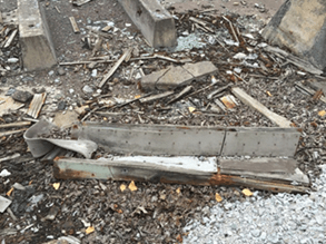 Asbestos containing material in the debris