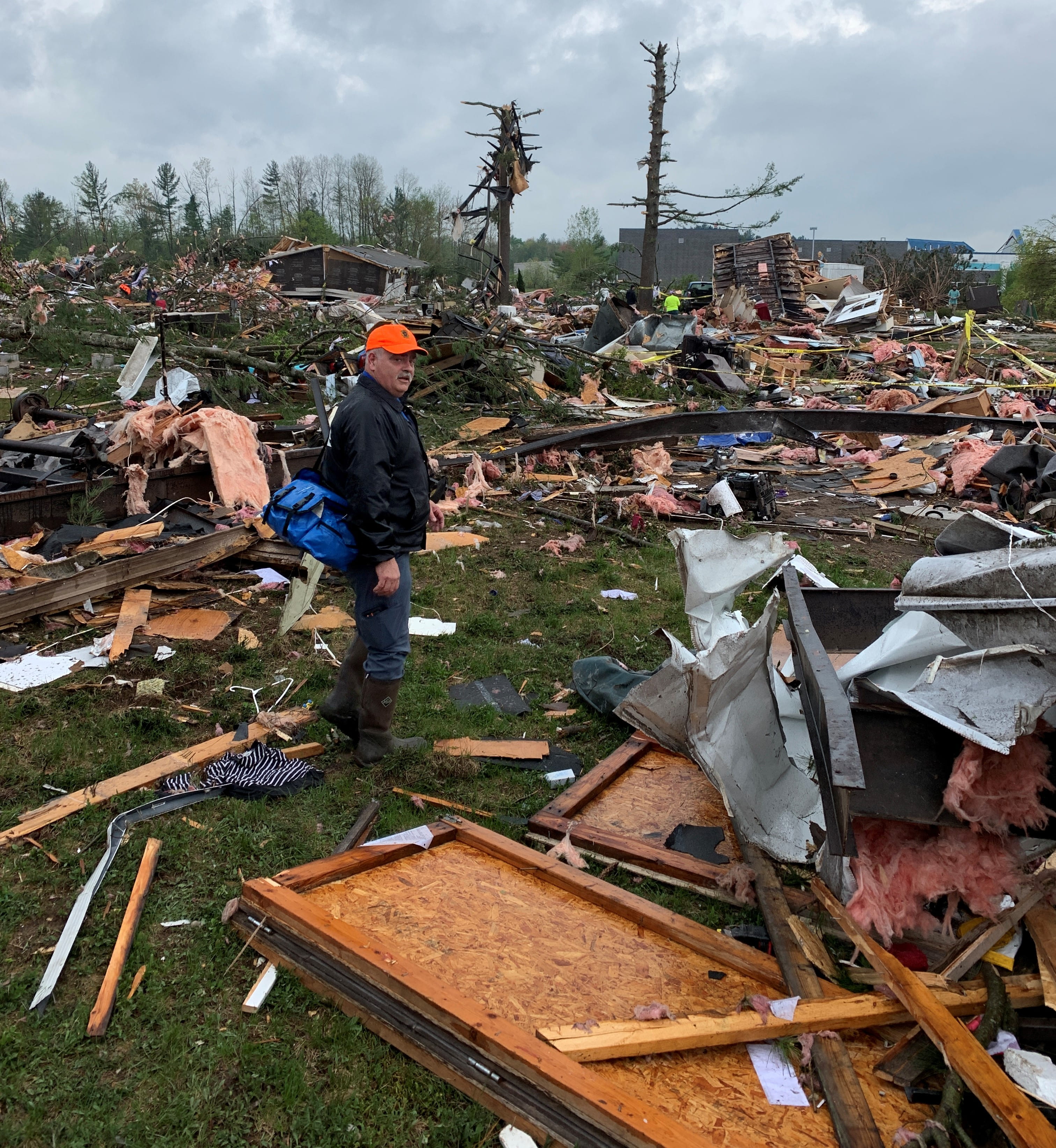After carrying out a victim, Vence Woods, environmental investigations supervisor, returns to the Nottingham Forest manufactured housing community to continue searching for more victims of the Gaylord tornado.