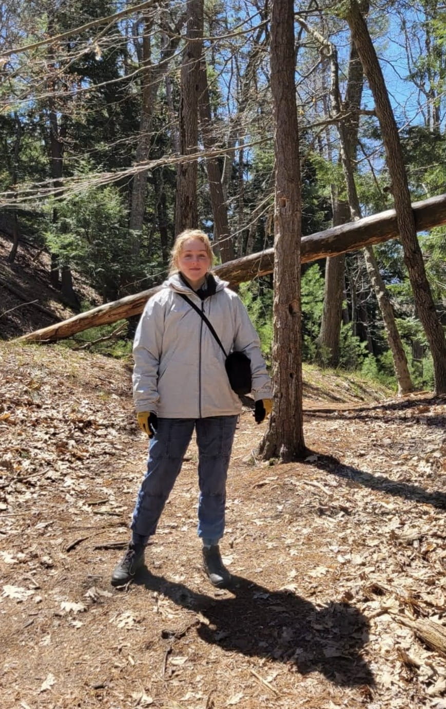 Intern Sailor Mayes hunts mushrooms and hikes in Ludington State Park, identifying insects along the way.