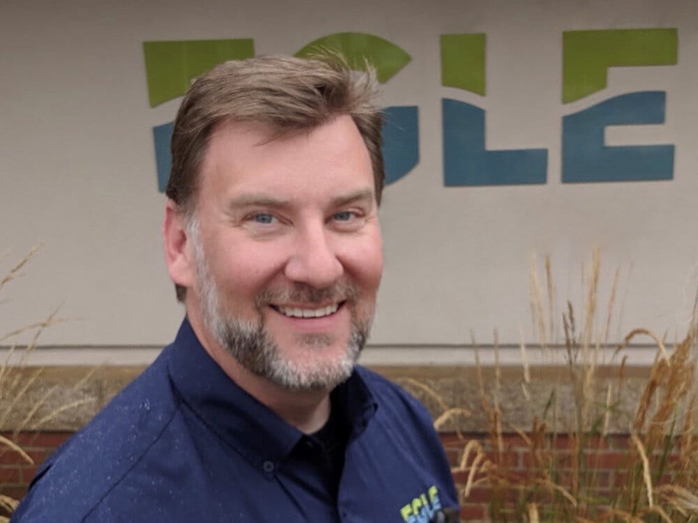 Chief Deputy Director Aaron Keatley, wearing a blue EGLE button up and smiling