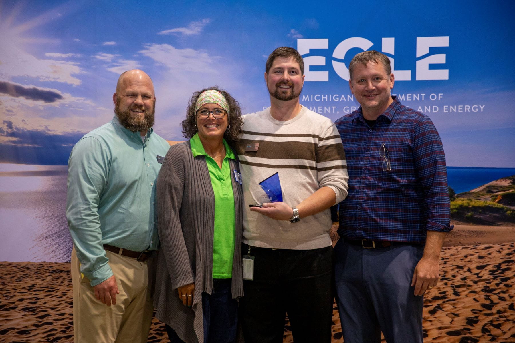 Paul McDonald, Jen Klang, Daniel Burlingame, and Jerrod Sanders (WRD Director).