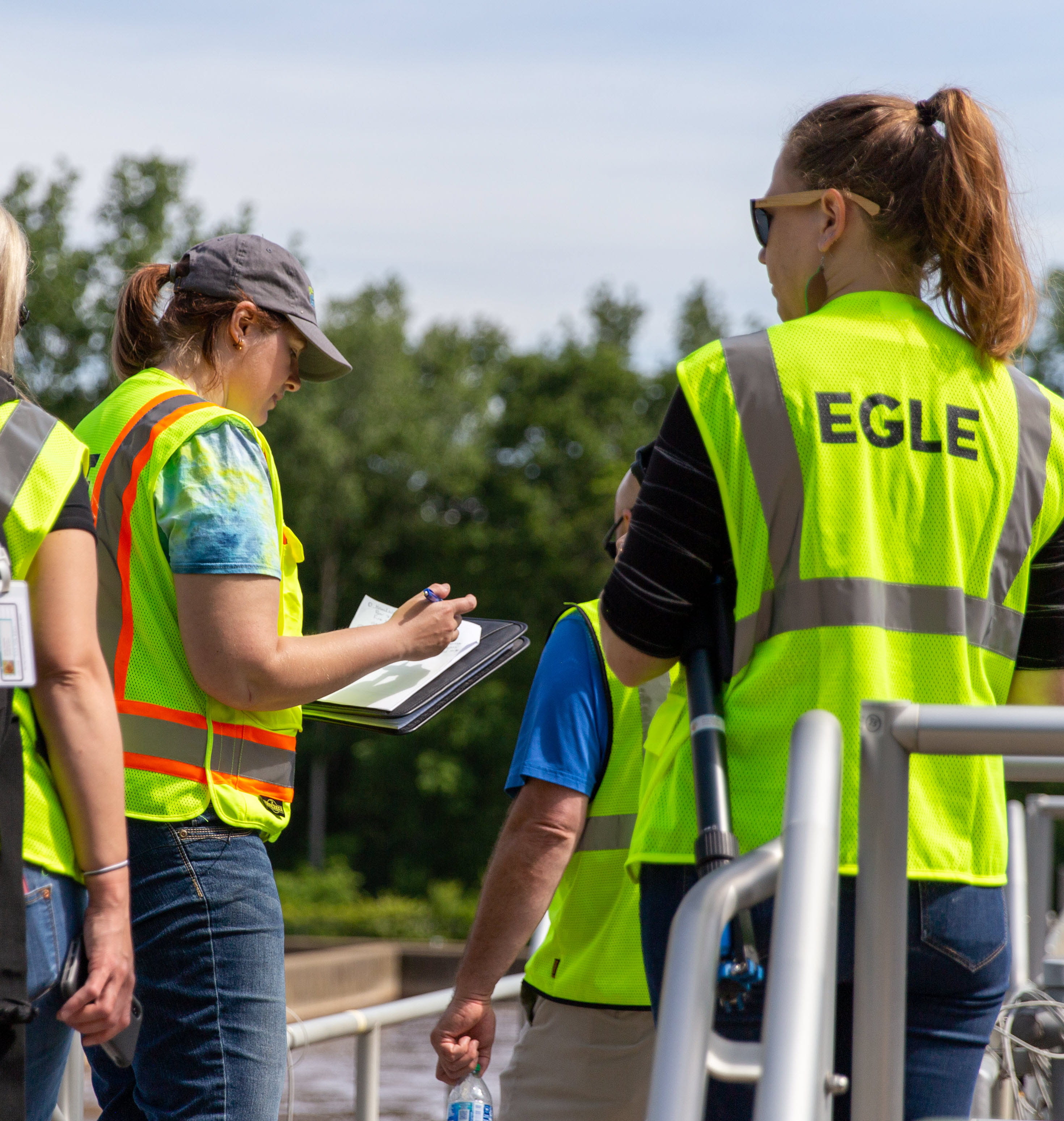 EGLE Staff visiting facility in safety vests