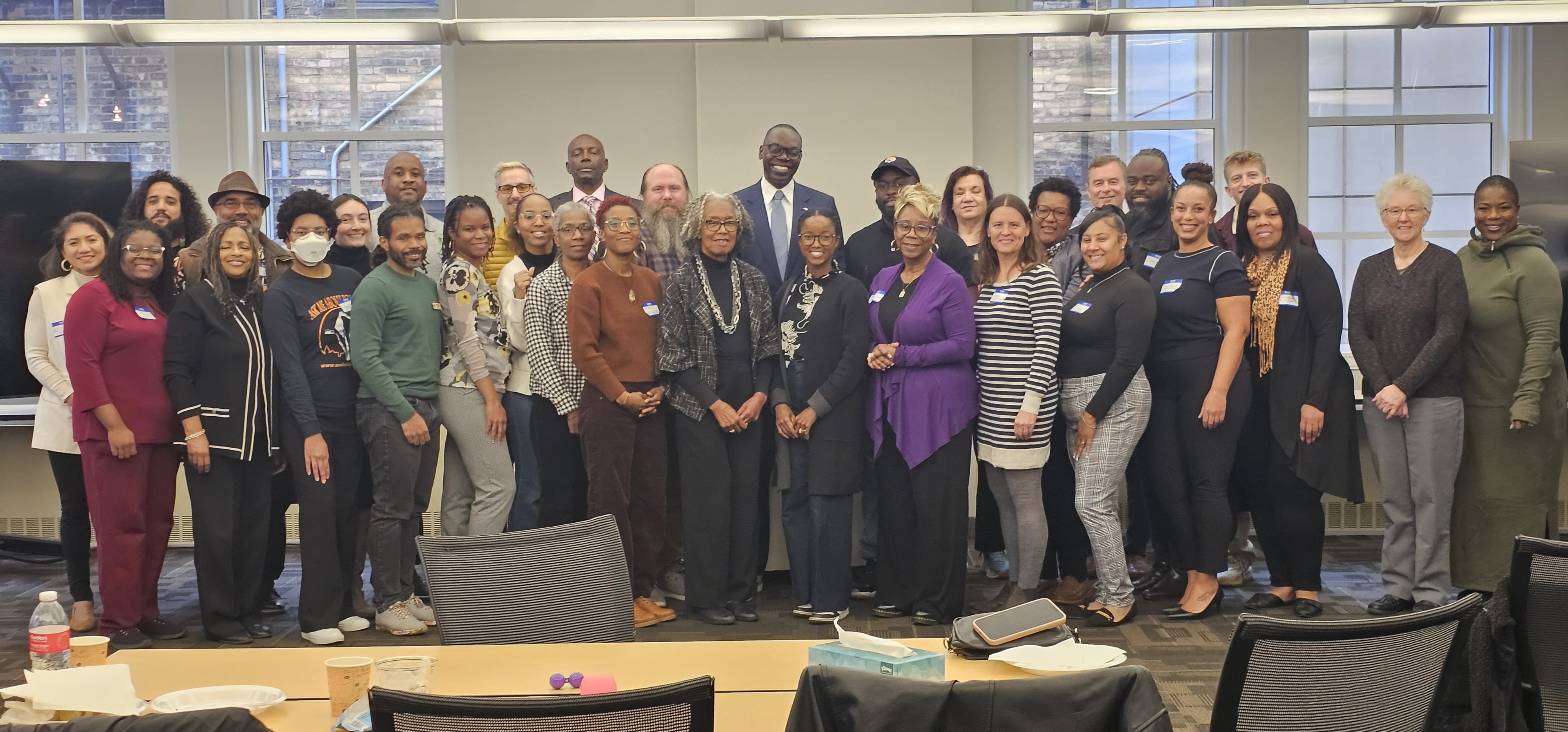 The MI Healthy Climate Community Accelerator cohort members with Michigan Lt. Gov. Gilchrist (at the center in the back row) at the celebration event.