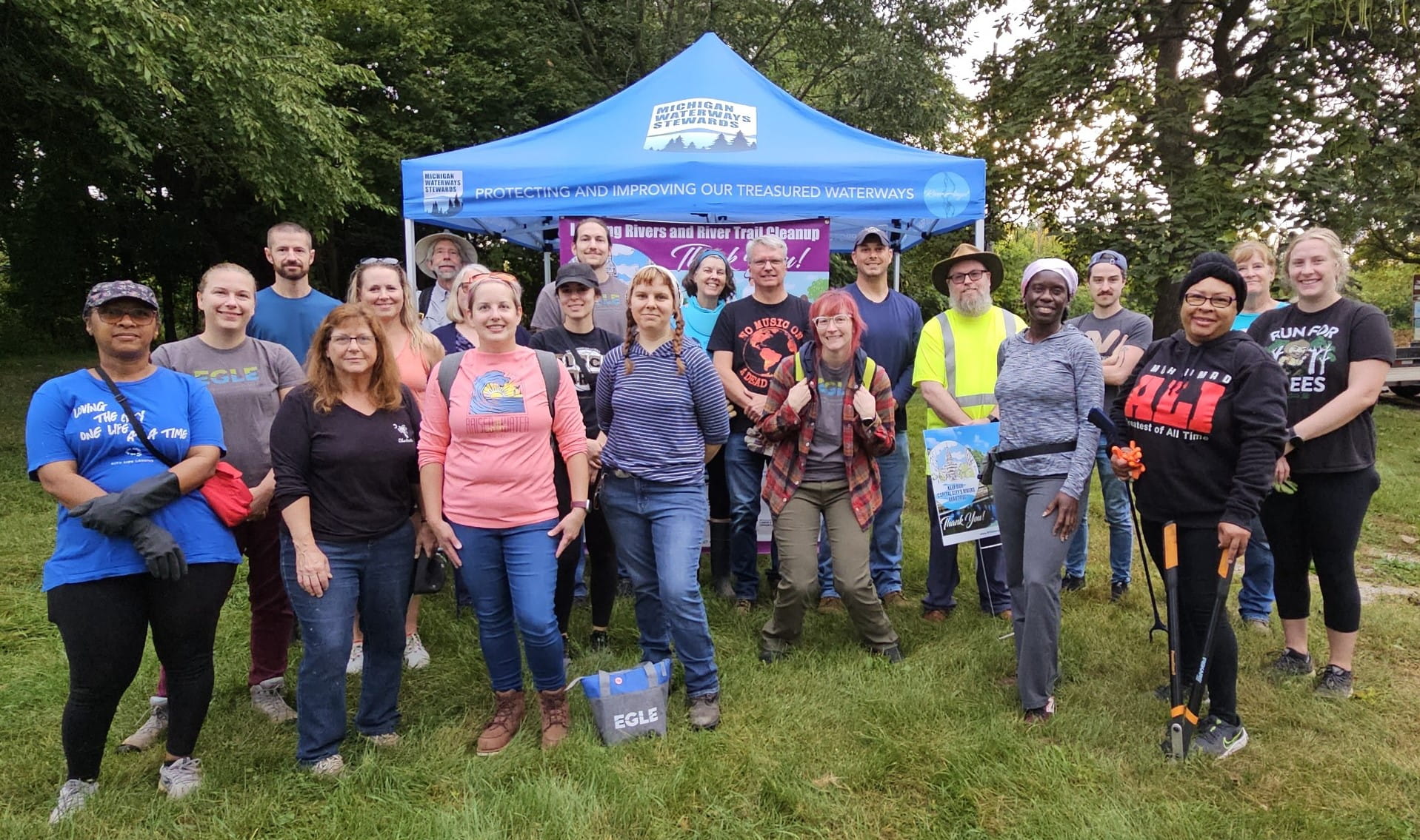 State of Michigan volunteers ready to work at 8 a.m. at Cherry Hill Park in Lansing, including EGLE volunteers Alyssa Seaton, Jane Emily White, Chelsea Dickerson in the first row; Rebecca Maurer in the second row; and John Riley, Mitch Hemesath, and Chris Svoboda in the back row. 