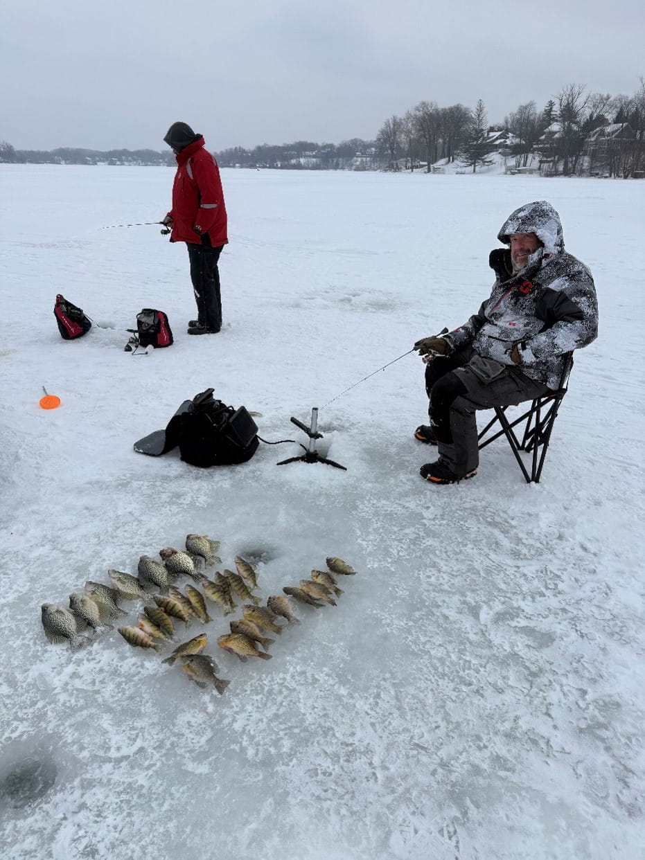 EGLE staff ice fishing at Reeds Lake in East Grand Rapids in February 2026