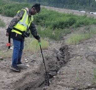 2025 EGLE intern Bryana Borders checks gas emissions at a Michigan landfill.