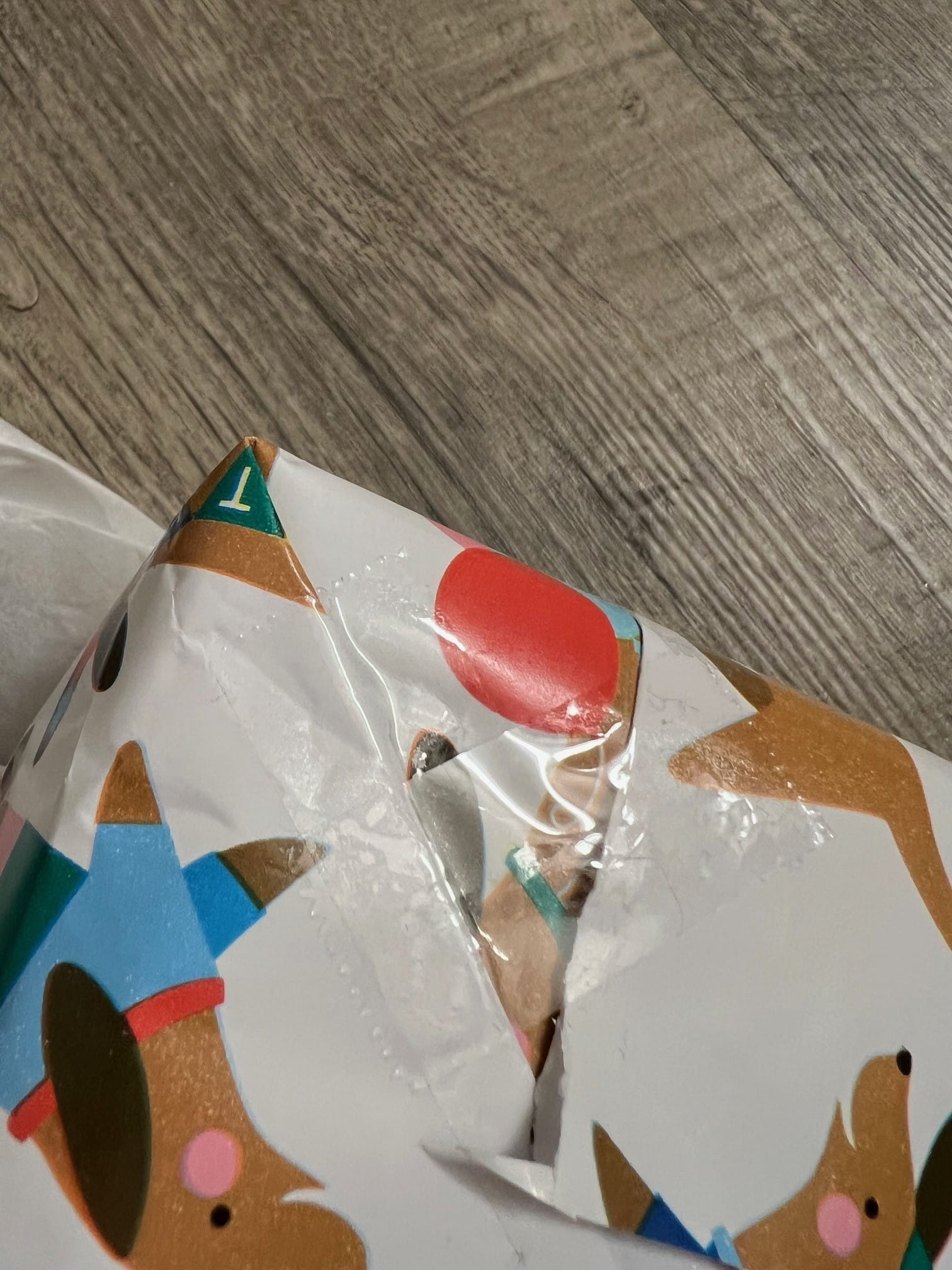 A gift box wrapped with excessive tape