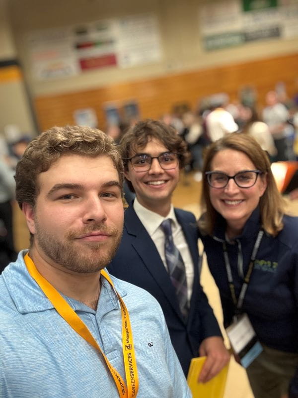Jennifer Kraut, environmental engineer with EGLE’s Air Quality Division, connects with two Michigan Technological University students about career opportunities EGLE has to offer