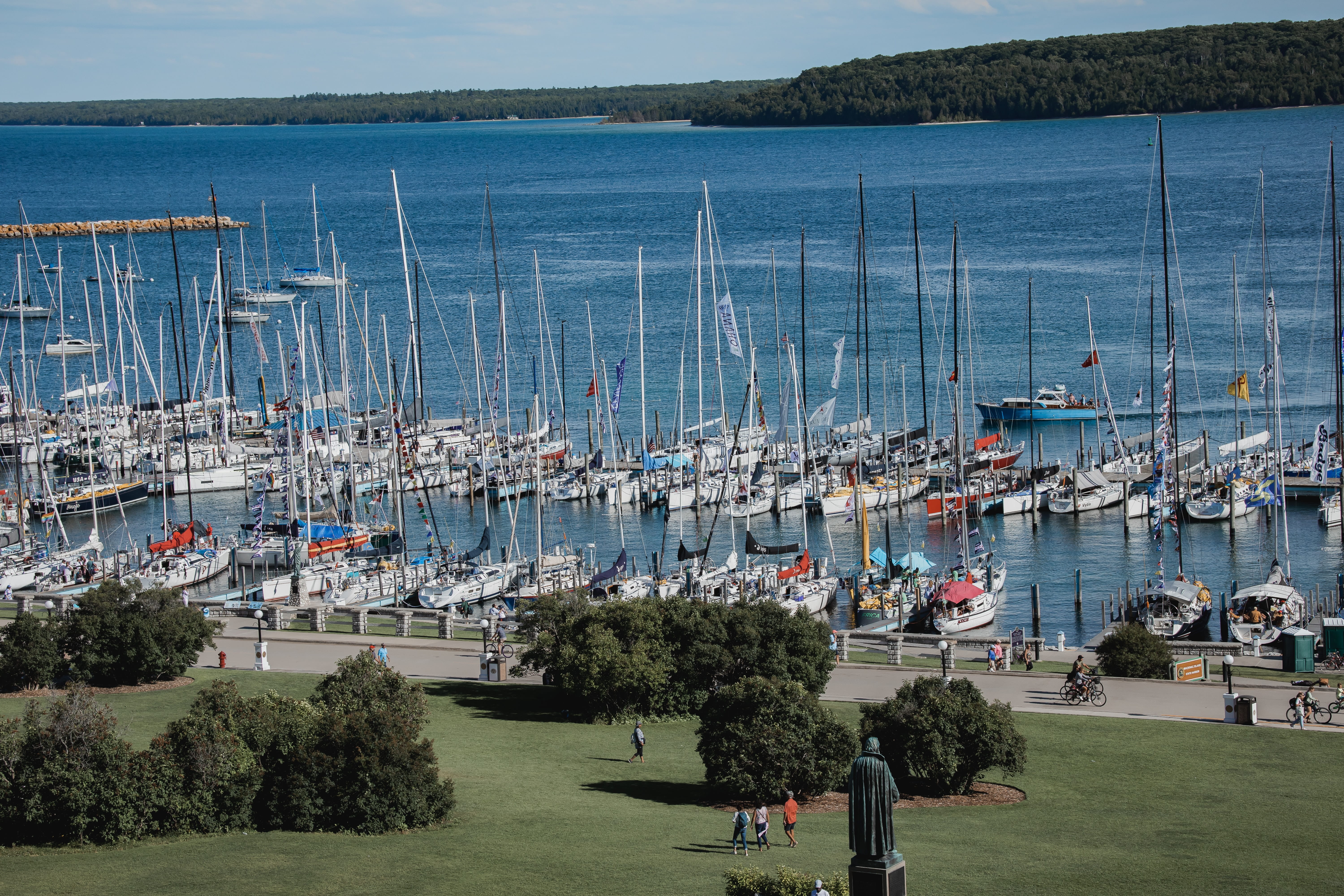 A marina on Mackinac Island, with boats docked along the entire shore