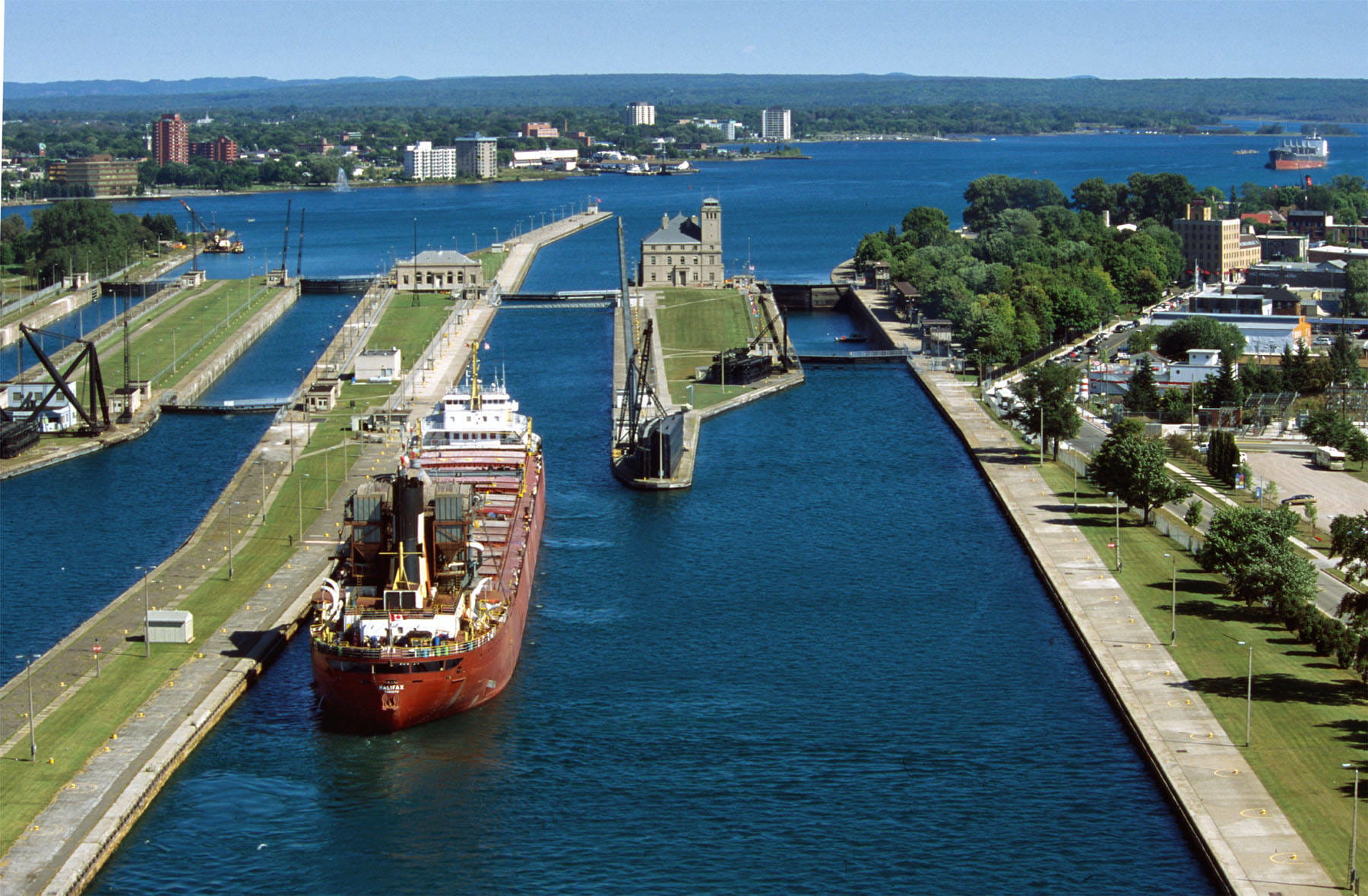 A boat sitting in the Soo Locks