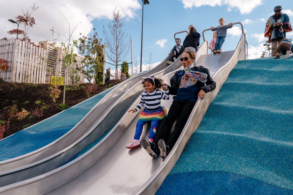 Families enjoy the park’s opening in fall 2025. Credit:  Detroit Riverfront Conservancy