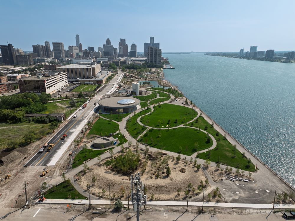 Aerial view of the Ralph C. Wilson, Jr. Centennial Park taking shape in July 2025 on the Detroit Riverfront. Credit: Detroit Riverfront Conservancy