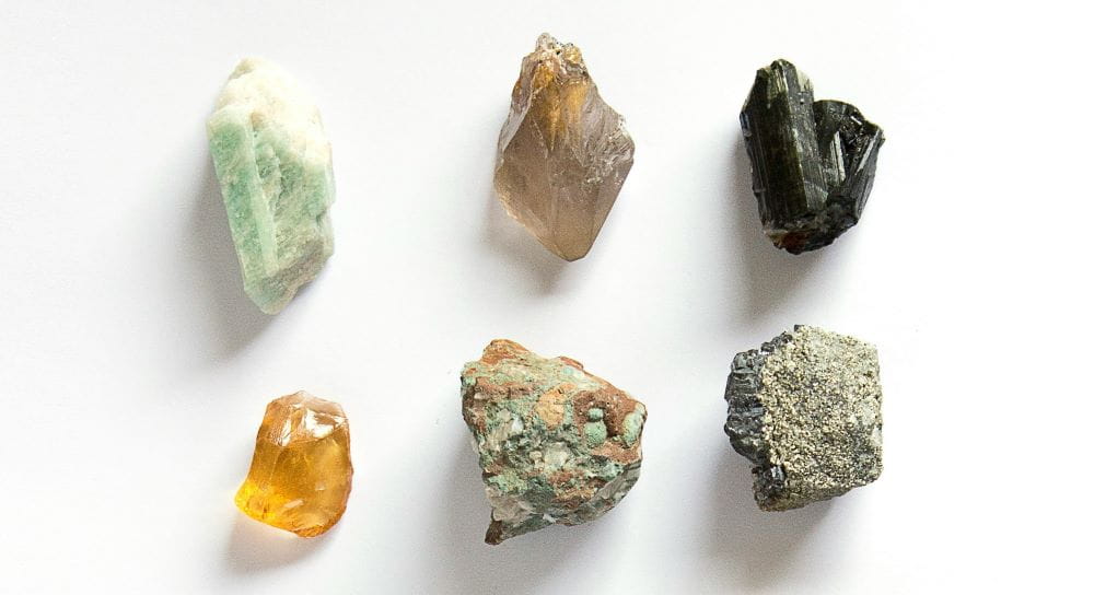 Six various minerals on a white background