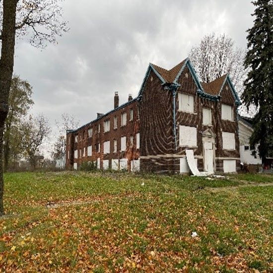 view of a house during a cloudy day