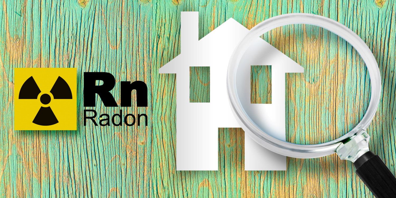 Graphic showing radon and radioactive symbols, along with a magnifying glass hovering over an illustration of a home. 