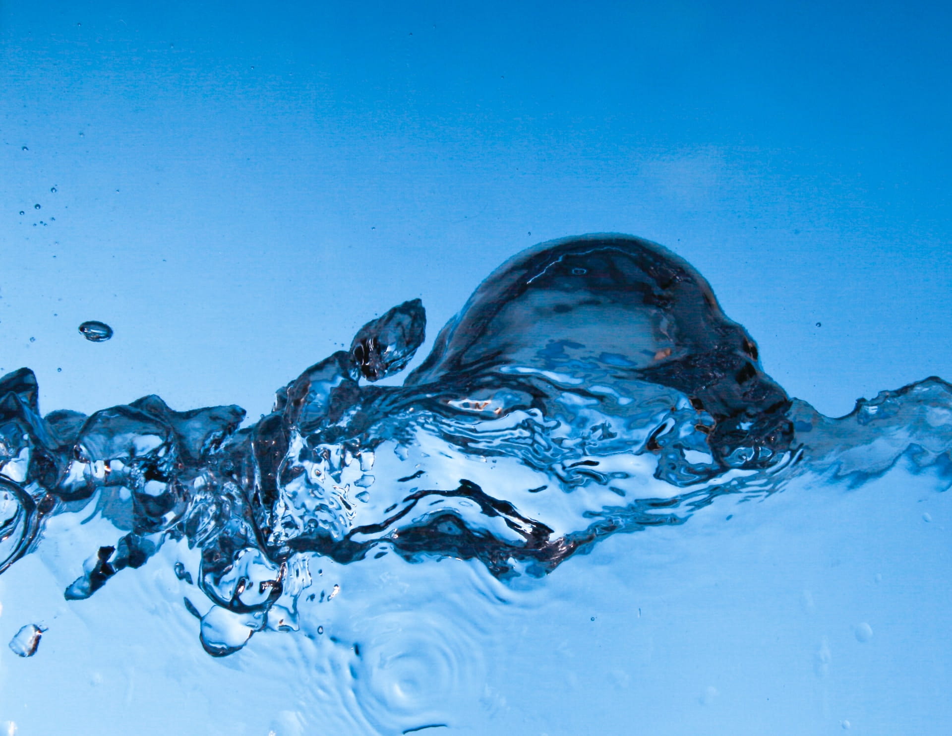 A swirl of water against a blue background