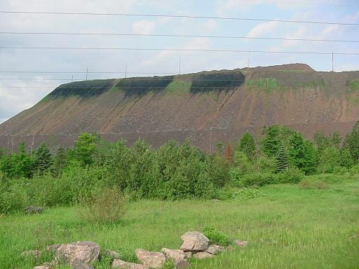 Biosolids on mine spoil pile after application