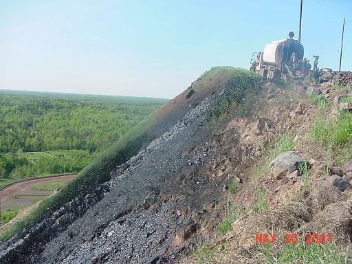 Biosolids application on mine spoil pile