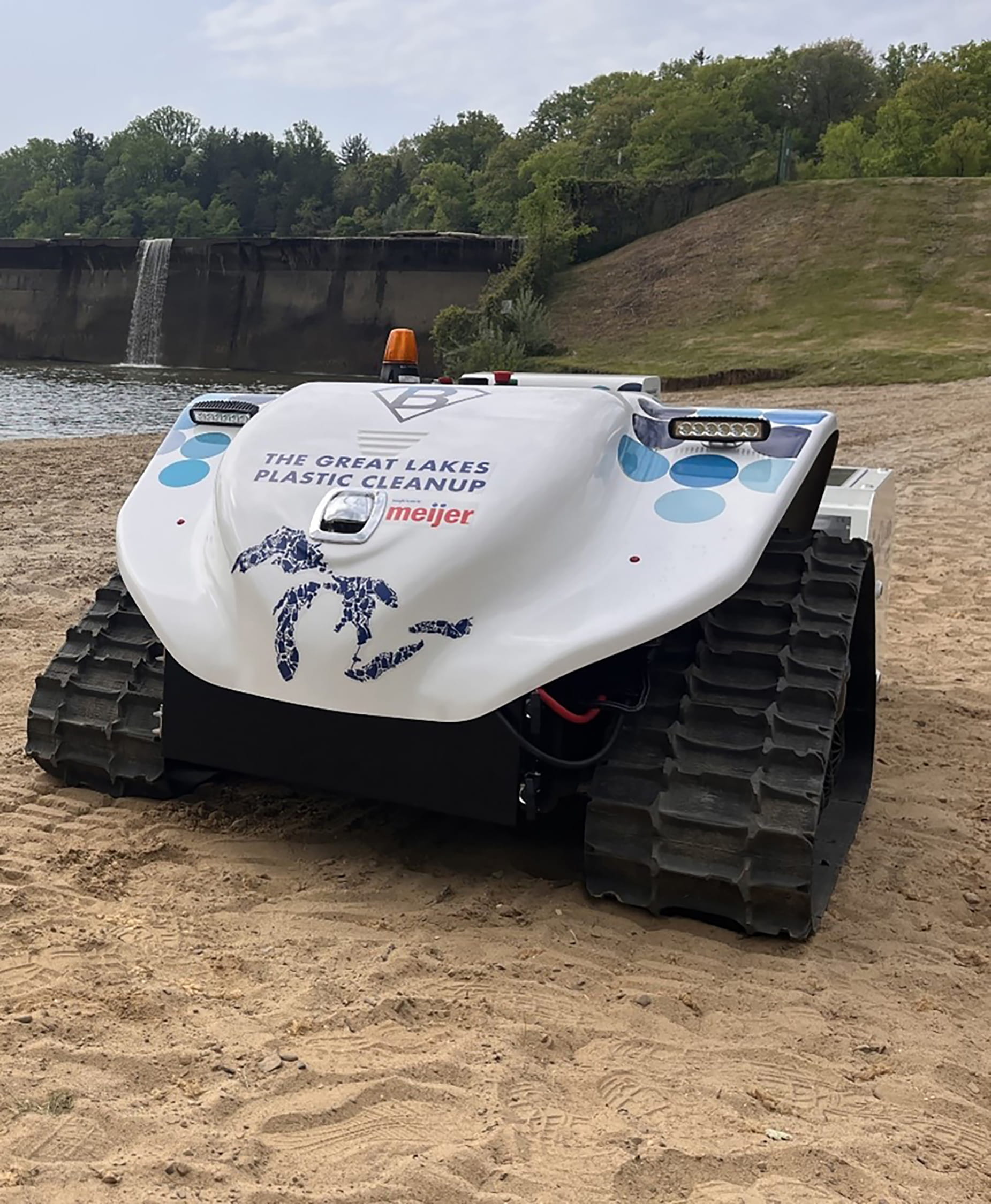 A beach-cleaning robot known as “BeBot,” an advanced method of managing litter that’s electric-powered and remote-operated, is helping keep Michigan's inland lake beaches and Great Lakes shorelines clean. Courtesy of DNR.