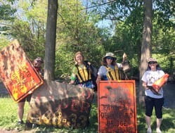 Clinton River Watershed Council volunteers and some of the trash they collected during one of the group's annual clean up events