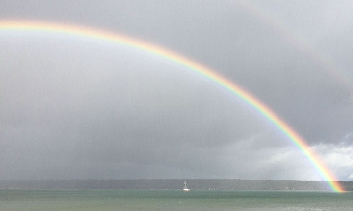 Rain and rainbow on the St. Mary's River