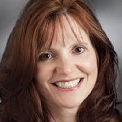 Head shot photo of Lisa Cripps-Downy.