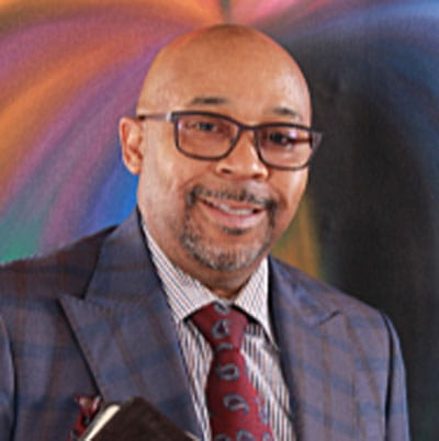 Head shot photo of Rev. Maurice McAfee.