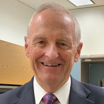 Head shot photo of Dr. William Pearson.