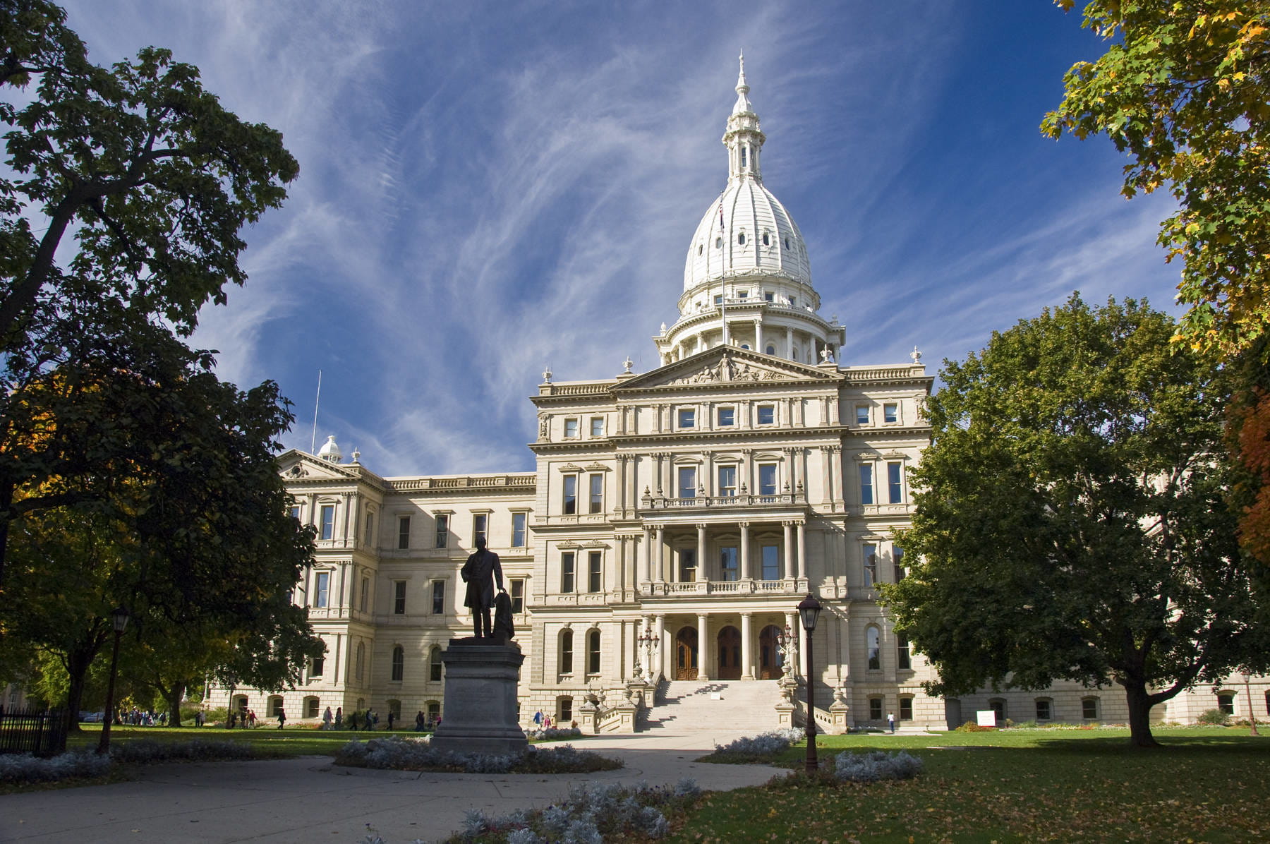 Photo of statue in front of the Michigan State Capitol.